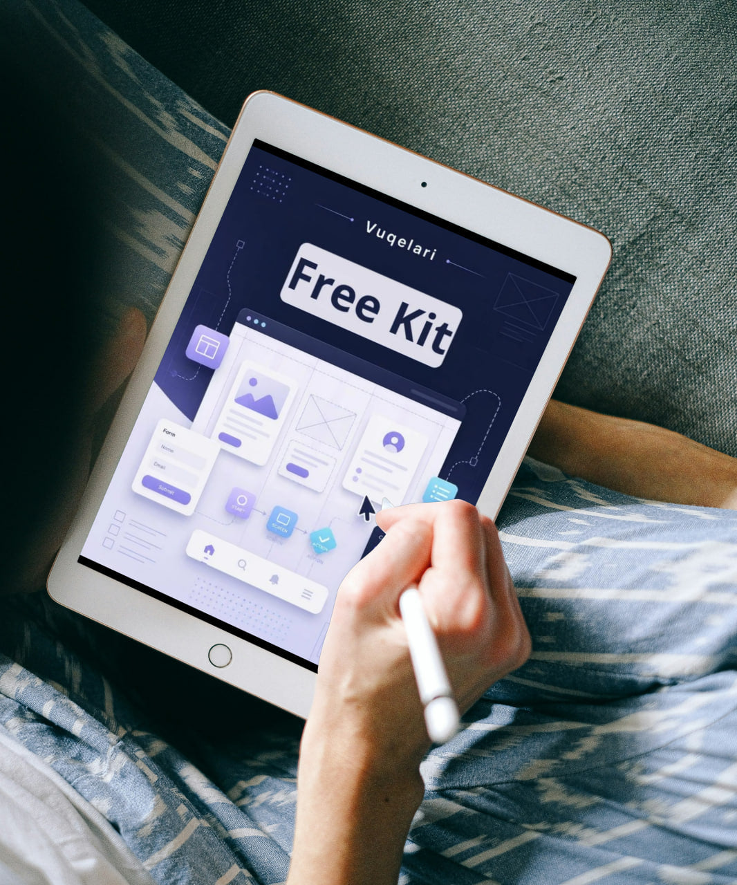 Person holding a tablet with a design app open on a textured surface